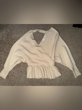 Peplum Wrap V-Neck Sweater — Cream